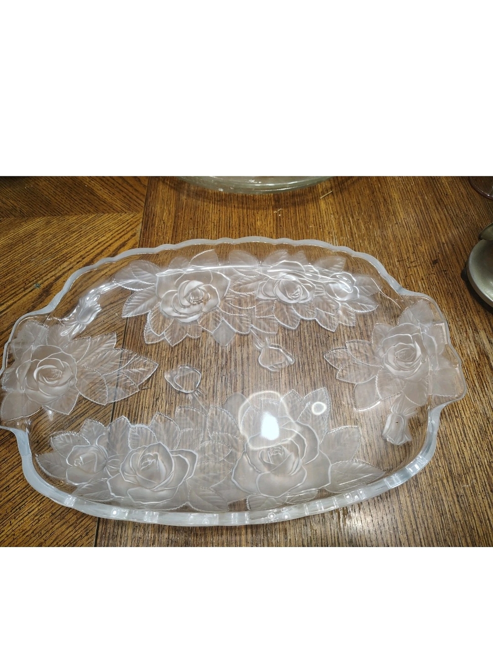 vintage serving tray featuring an elegant embossed and frosted rose pattern.
